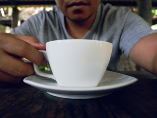 Asia man selfie and drinking hot coffee in the morning.