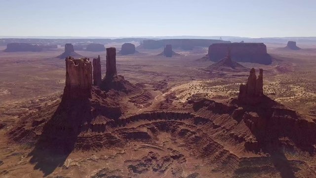 Raw drone footage of the Stagecoach in Monument Valley with the Big Indian and Sentinel Mesa on background