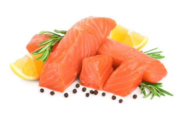 raw salmon piece cube with rosemary, lemon and peppercorn isolated on white background close up