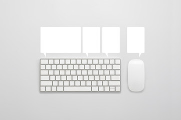 keyboard mouse in white background with dialog bubble.
