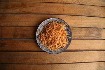 plate of spaghetti pasta with tomato