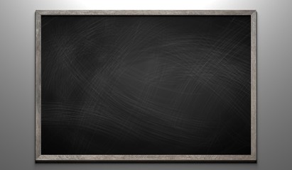 Rubbed out chalk on a blackboard with wooden frame © PX Media