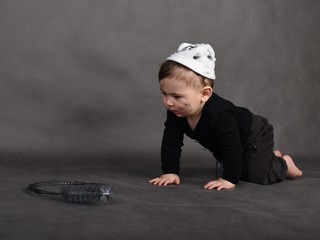 portrait of a little boy in a chimney-sweep costume