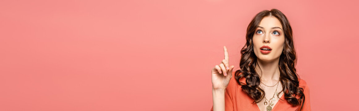 Panoramic Shot Of Thoughtful Young Woman Showing Idea Gesture While Looking Up Isolated On Pink