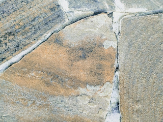 Stone rock tiles pieces glued together making a interesting modern design in the home interior with a broken crack for decorative effect