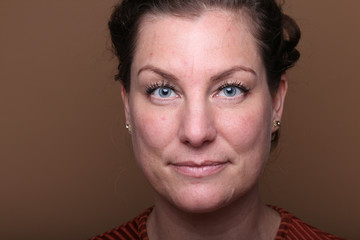 Fototapeta premium Beautiful woman in front of a background