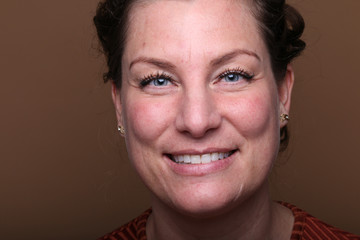 Fototapeta premium Beautiful woman in front of a background