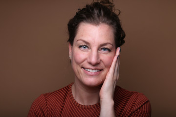 Beautiful woman in front of a background