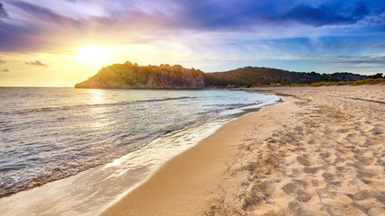Amazing sunset view with multicolored clouds. Incredibly romantic sunrise on Voidokilia beach,...