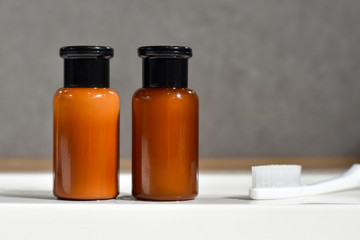 Shower cream in a portable plastic bottle for personal use.
