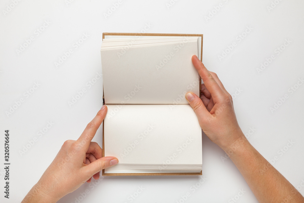Poster a5 open book mockup with hands. empty template of page. blank for design. isolated on white backgrou