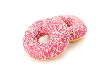Tasty pink donuts isolated on white background