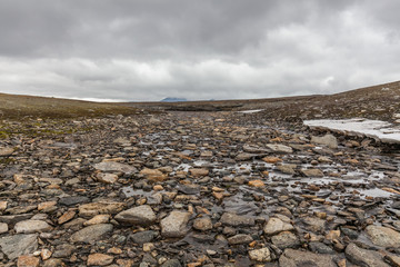 View of the valley. Northern Sweden, Sarek National Park in stormy weather. selective focus