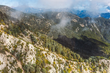 Amazing scenic aerial view of high green mountains and cloudy sunny blue sky. Landscape of Turkey....