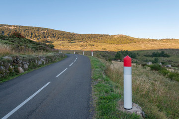 France. petite route des C&eacute;vennes avec des bornes de s&eacute;curit&eacute;
