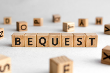 Bequest - words from wooden blocks with letters, Last Will And Testament  bequest concept, white background