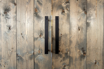 Modern wooden brown doors closeup storage, retro modern interior background texture