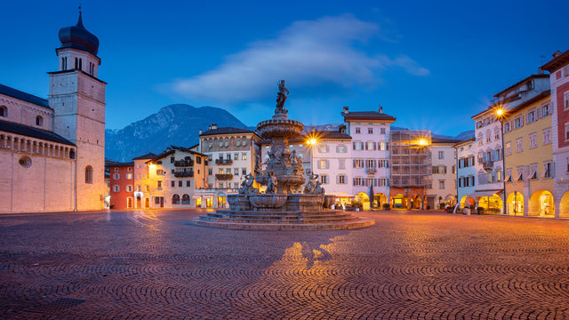 Trento, Italy. Cityscape image of historical city of Trento, Trentino, Italy during twilight blue hour.