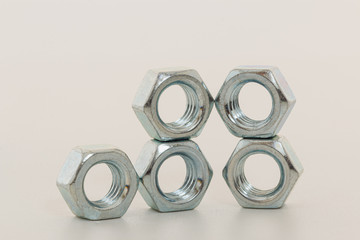 Metal  nut on a white background