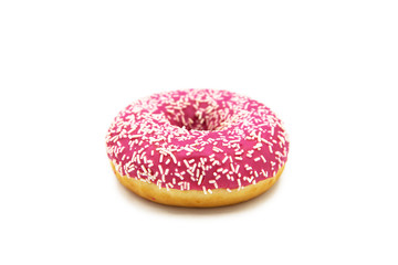 Donut with pink icing and white sprinkles isolated on white background. 