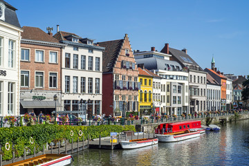 Restaurants and sightseeing boats along the Kraanlei / Crane Lane in the city Ghent / Gent, East Flanders, Belgium