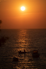 Lucice beach near Petrovac, Montenegro. Lucice landscape- sandy beach on Montenegrin coast with clear water and pine trees around on sunset.