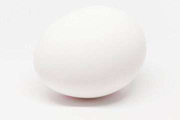 a white egg on a light background, something of a classic