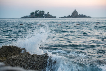 Blurred waves broken in rocks in Petrovac, coast of Montenegro