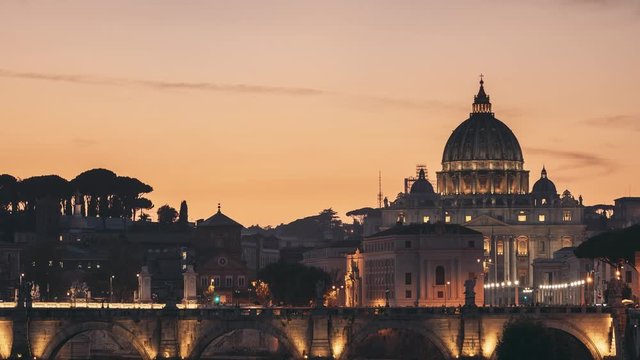 Vatican, Italy. Papal Basilica Of St. Peter In The Vatican And Aelian Bridge In Evening Night Illuminations. Day To NIght Time Lapse. Sunset Time