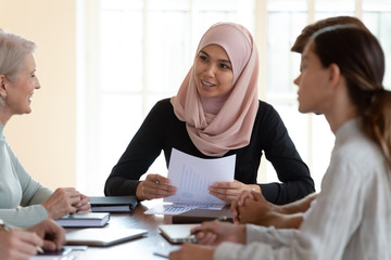 Arabic businesswoman lead team meeting in office