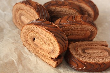 Delicious chocolate roll with cocoa cream macro