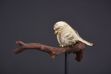 A Golden Bird Ornament commonly used by people in China and Asia. It can symbolize wealth and good luck