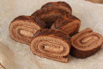 Delicious chocolate roll with cocoa cream macro