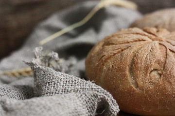 Delicious white bread with rye on the table 