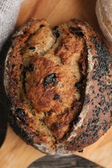 Fresh bread with black sesame and raisins