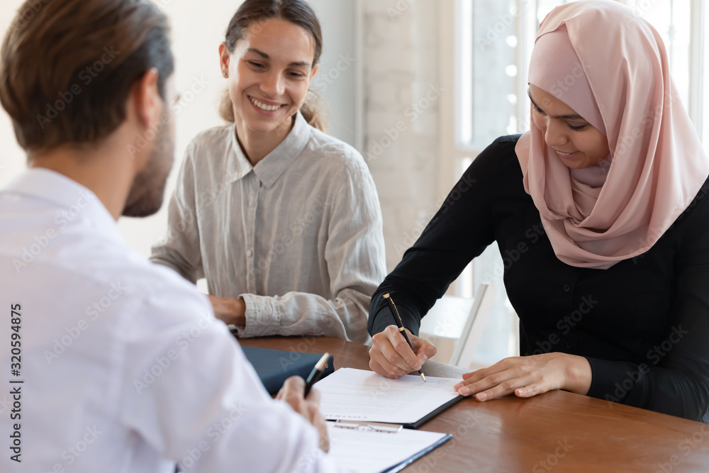 Sticker Multiracial business partners sign contract at meeting