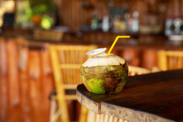 Fresh coconut drink on the table