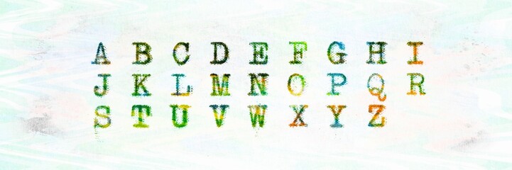 Panoramic image. Alphabet written with an old typewriter in many colors