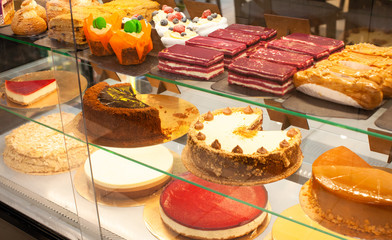 Showcase with cakes, pastries, biscuits. Small business