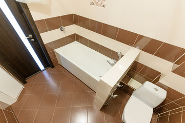 Russia, Moscow- October 10, 2019: interior room apartment modern bright cozy atmosphere. bathroom, sink, decoration elements, toilet