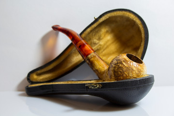 decoration of a pipe in a decorative box