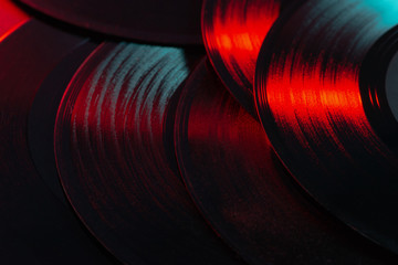 Vinyl records music background, texture, 80's, vintage, retro, acoustic, eighties, disco, gradient colours, close-up, party