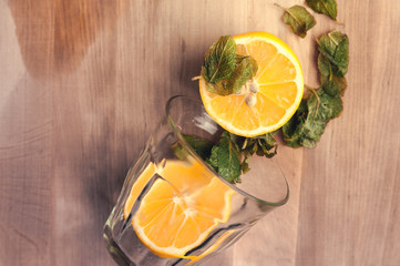 lemon with mint in a glass