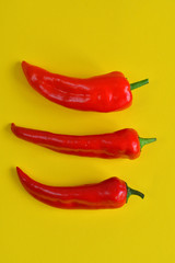 red bell pepper on a yellow background
