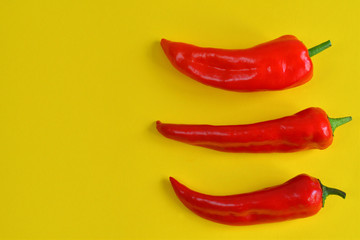 red bell pepper on a yellow background