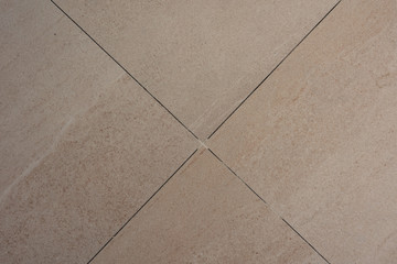Fototapeta premium Cleaning of ceramic mosaic from dirt and dust after repair work.