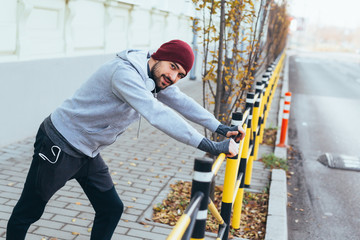 young man outdoor preparing for jogging