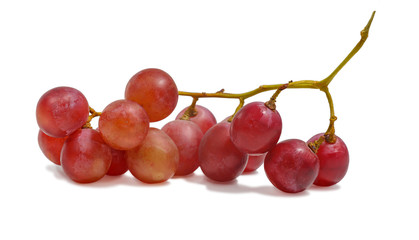 Red grapes on an isolated white background. Fresh juicy fruit