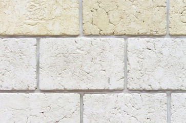 Blocks from a natural finishing stone. Quartz stone texture for room decor. Background of rough stone.