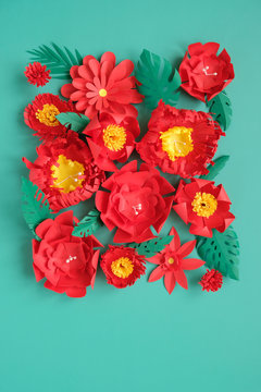 Hello, Spring. With Red Paper Flowers And Green Leaves